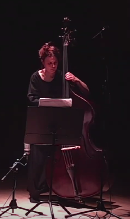 Solo double bass performance still